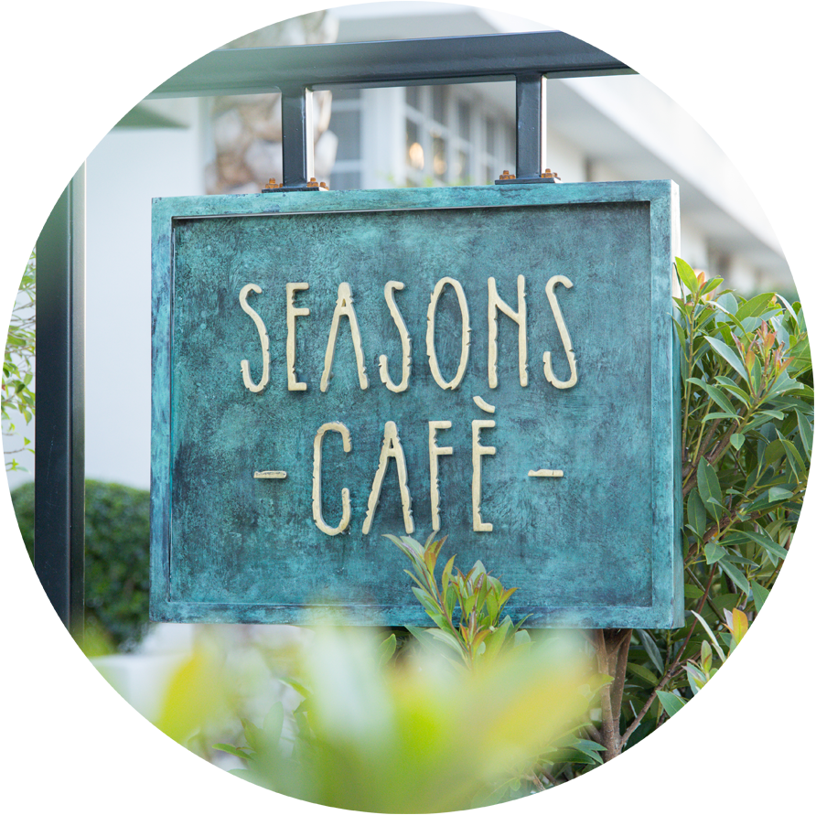 Outdoor signage saying Seasons Cafe